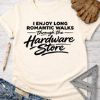 Women's funny woodworking graphic tee shirt for female woodworkers, makers, and DIY builders — Sawdust & Ponytails. Cream t-shirt with "I Enjoy Long Romantic Walks Through The Hardware Store" in black text.