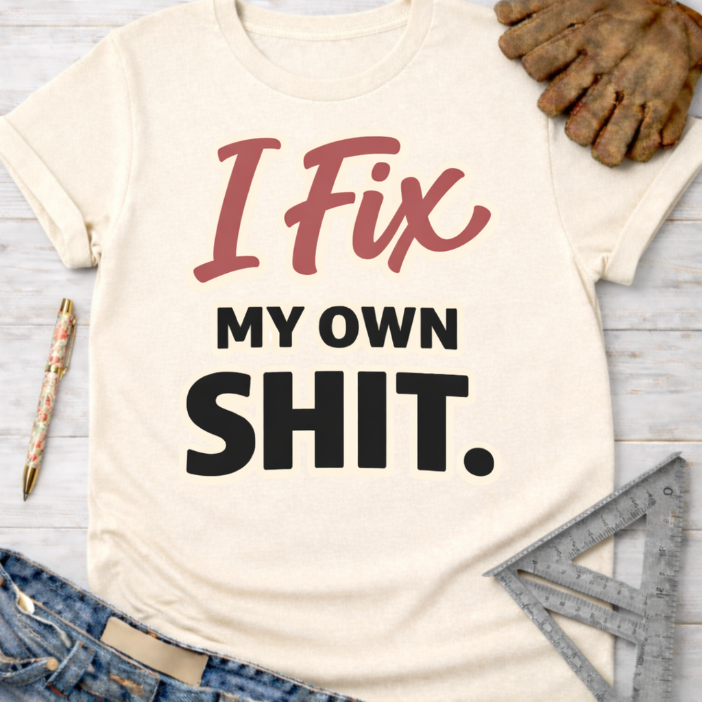 Women's funny woodworking graphic tee shirt for female woodworkers, makers, and DIY builders — Sawdust & Ponytails. Cream t-shirt with "I Fix My Own Shit" in red and black text.