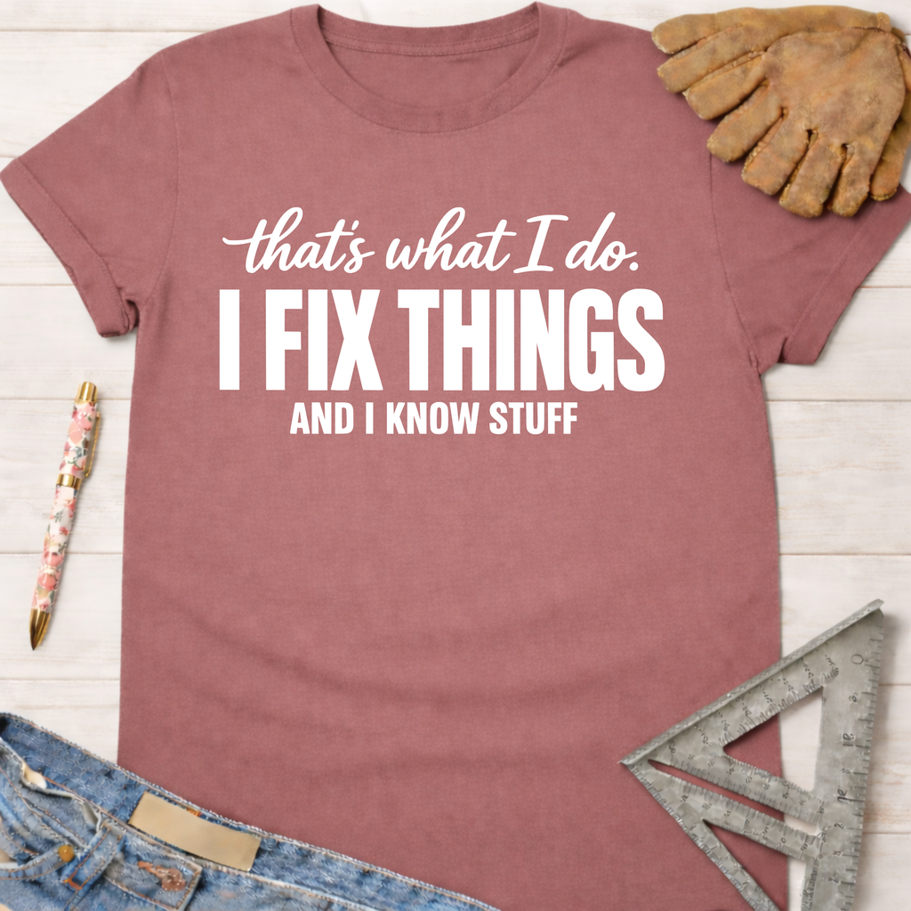 Women's funny woodworking graphic tee shirt for female woodworkers, makers, and DIY builders — Sawdust & Ponytails. Mauve cotton tee with "I FIX THINGS AND I KNOW STUFF" in white.
