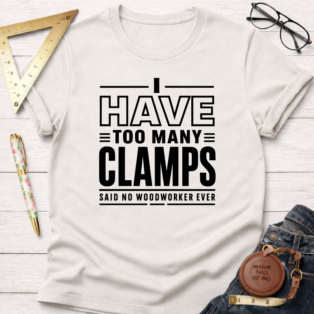Cream cotton t-shirt with "I Have Too Many Clamps Said No Woodworker Ever" text.