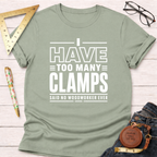 Sage green cotton t-shirt with "I Have Too Many Clamps Said No Woodworker Ever" in white text.
