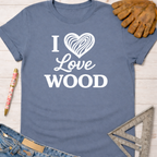 Women's funny woodworking graphic tee shirt for female woodworkers, makers, and DIY builders — Sawdust & Ponytails. Blue cotton "I Love Wood" t-shirt with white heart graphic.