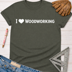 Women's funny woodworking graphic tee shirt for female woodworkers, makers, and DIY builders — Sawdust & Ponytails. Dark gray tee with "I ❤️ WOODWORKING" in white.