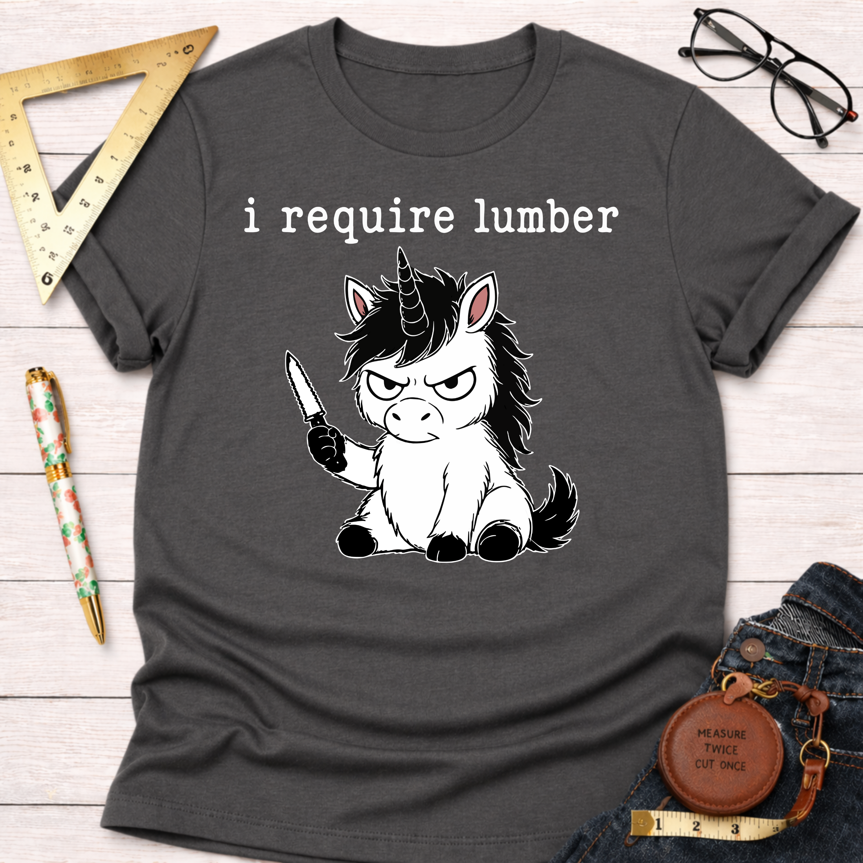 Dark gray "I Require Lumber" t-shirt with an angry unicorn holding a knife.