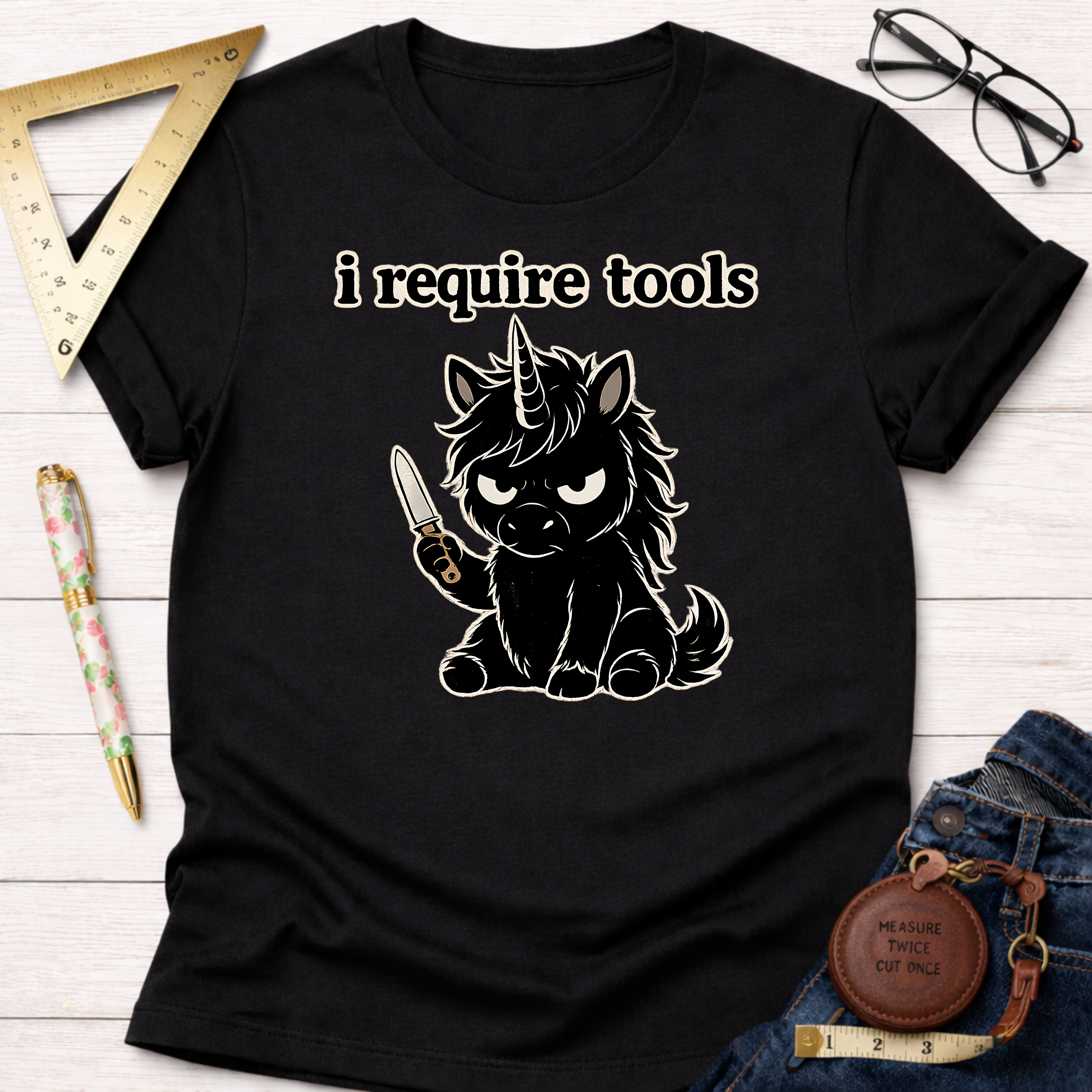 Black "I Require Tools" t-shirt with an angry black unicorn holding a knife.