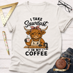 Cream "I Take Sawdust In My Coffee" t-shirt with a cute Highland cow carpenter design.