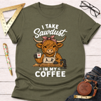 Olive green cotton t-shirt with a cartoon Highland cow wearing an apron, holding coffee, and "I Take Sawdust In My Coffee" text.