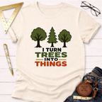 Cream t-shirt with "I Turn Trees Into Things" graphic and three green trees, styled with jeans and tools.