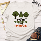 Cream cotton t-shirt with "I Turn Trees Into Things" text and three tree graphics.