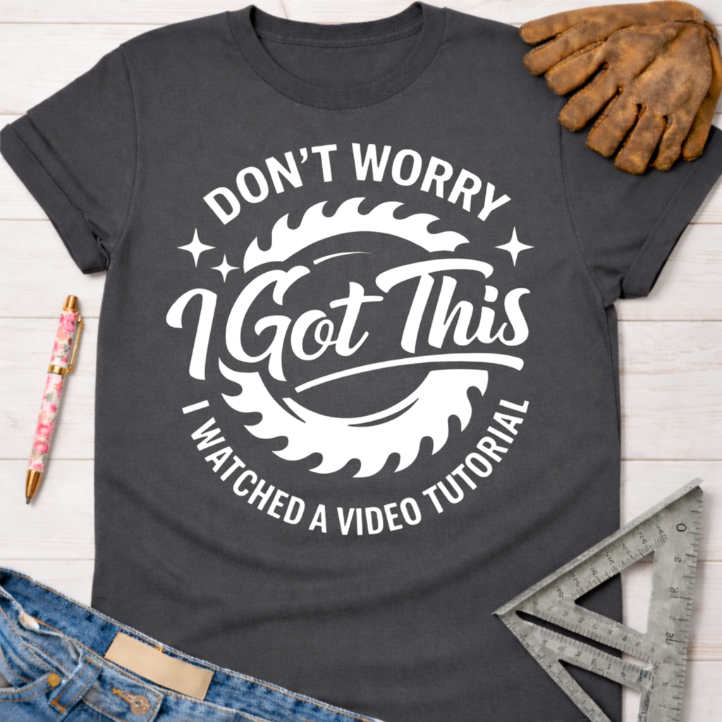 Women's funny woodworking graphic tee shirt for female woodworkers, makers, and DIY builders — Sawdust & Ponytails. Dark gray cotton t-shirt with "Don't Worry I Got This I Watched a Video Tutorial" graphic.