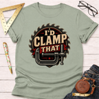 Sage green "I'd Clamp That" graphic t-shirt with a saw blade and clamp design.