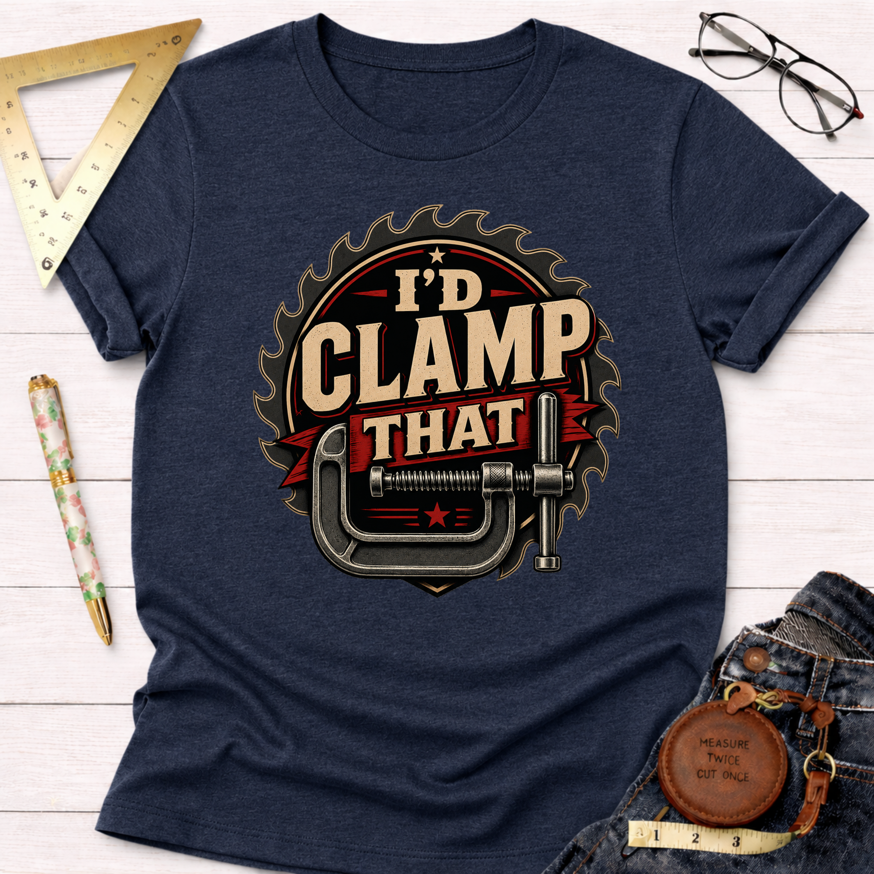 Navy blue "I'd Clamp That" t-shirt with a saw blade and clamp graphic.