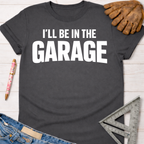 Dark gray "I'LL BE IN THE GARAGE" graphic tee, women's funny woodworking shirt for makers and DIY builders — Sawdust & Ponytails.