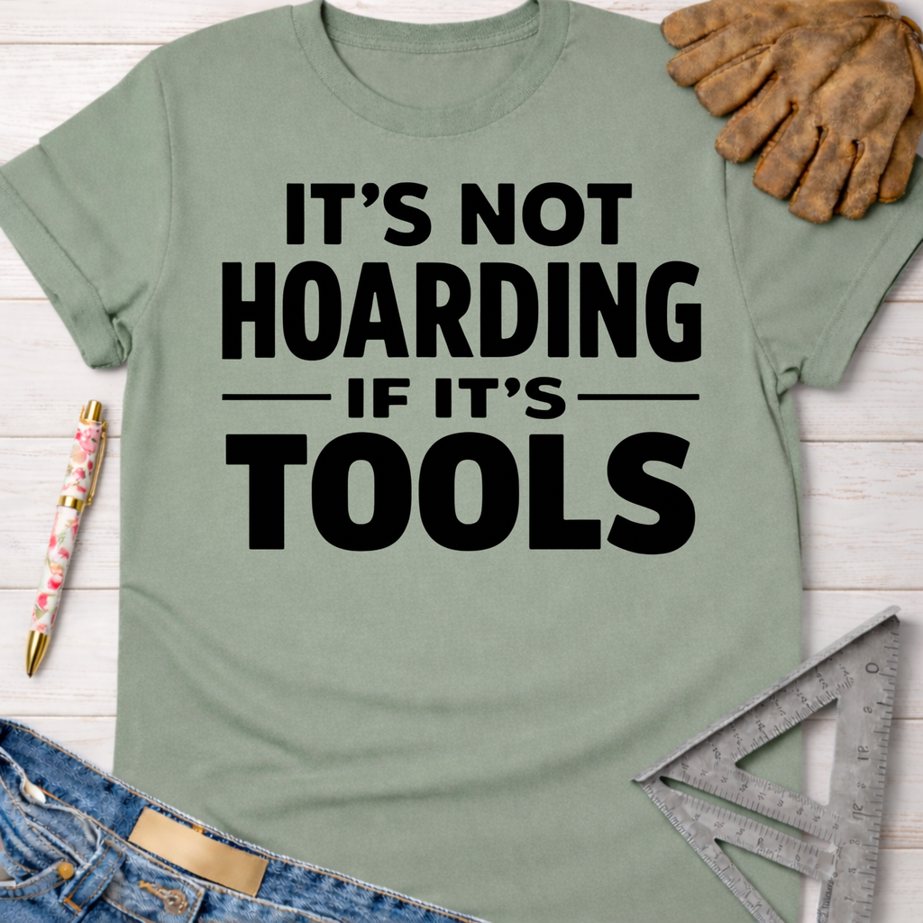 Women's funny woodworking graphic tee shirt for female woodworkers, makers, and DIY builders — Sawdust & Ponytails. Sage green cotton tee with "It's Not Hoarding If It's Tools" in black text.