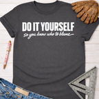 Charcoal gray women's "DO IT YOURSELF so you know who to blame" graphic tee. Women's funny woodworking graphic tee shirt for female woodworkers, makers, and DIY builders — Sawdust & Ponytails