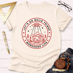 Cream t-shirt with "Let's Go Build Things Workshop Life" red graphic featuring a UFO abducting a workshop.