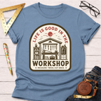 Women's funny woodworking graphic tee shirt for female woodworkers, makers, and DIY builders — Sawdust & Ponytails. Light blue cotton tee with "Life Is Good In The Workshop" graphic.