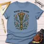 Light blue cotton t-shirt with "Made To Make" text and a floral paint brush design.