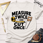 White cotton t-shirt with "Measure Twice And Cut Once" graphic featuring a tape measure and hand saw.