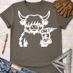 Women's funny woodworking graphic tee shirt for female woodworkers, makers, and DIY builders — Sawdust & Ponytails. Dark gray t-shirt with a white graphic of a shaggy cow holding a drill.