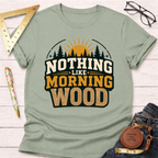 Sage green "Nothing Like Morning Wood" T-shirt with a sunrise, forest, and wood grain text design.