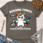 Women's funny woodworking graphic tee shirt for female woodworkers, makers, and DIY builders — Sawdust & Ponytails. Dark gray cotton tee with a cartoon unicorn holding a hammer, drill, and circular saw. Text reads "BUILDING THINGS BECAUSE MURDER IS WRONG".
