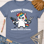 Women's funny woodworking graphic tee shirt for female woodworkers, makers, and DIY builders — Sawdust & Ponytails. Blue cotton tee with a unicorn holding a glue gun and scissors.