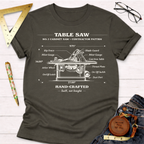Dark gray women's funny woodworking graphic tee with white table saw blueprint illustration, for female woodworkers, makers, and DIY builders — Sawdust & Ponytails