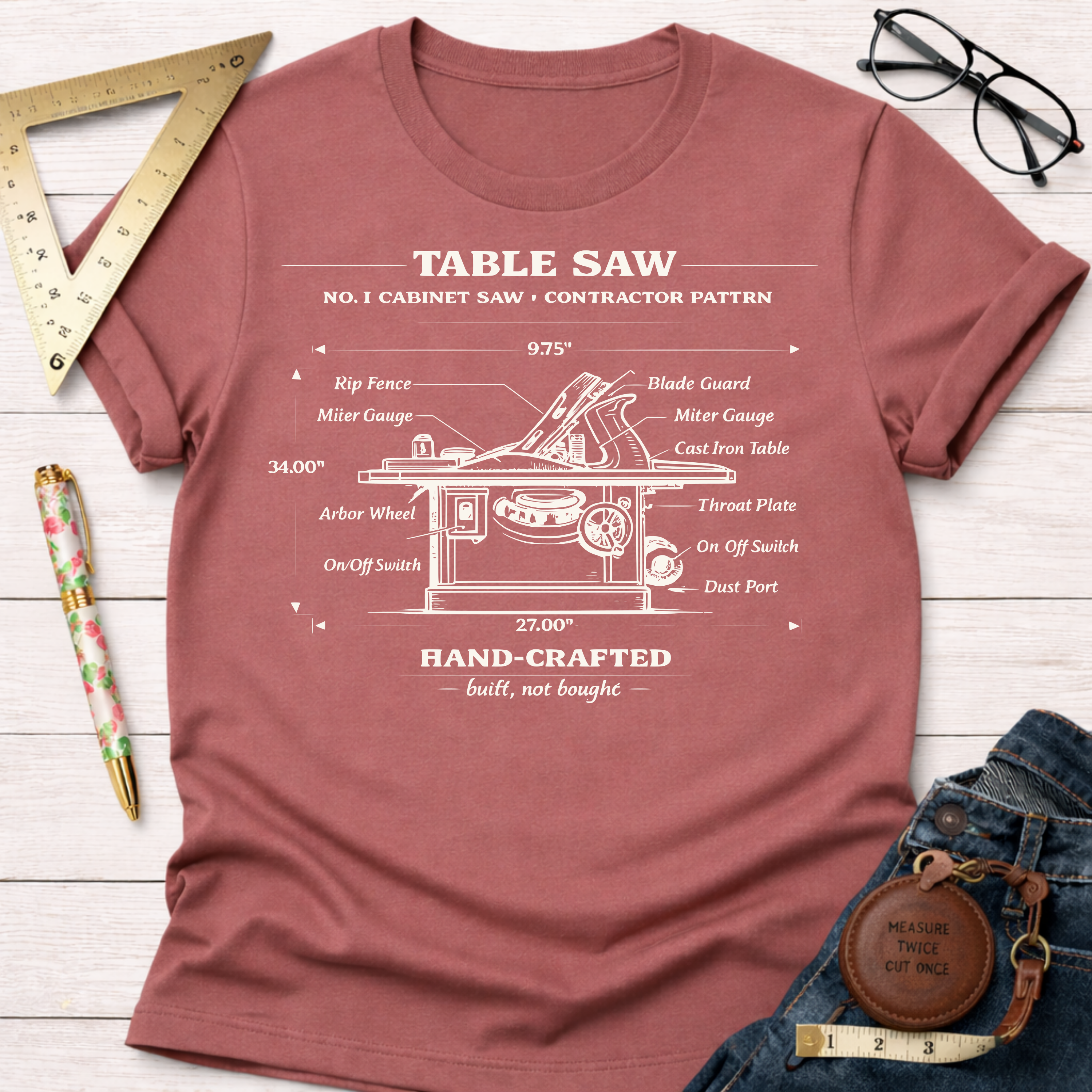 Women's funny woodworking graphic tee shirt for female woodworkers, makers, and DIY builders — Sawdust & Ponytails. Heather red t-shirt with a white vintage table saw blueprint illustration.