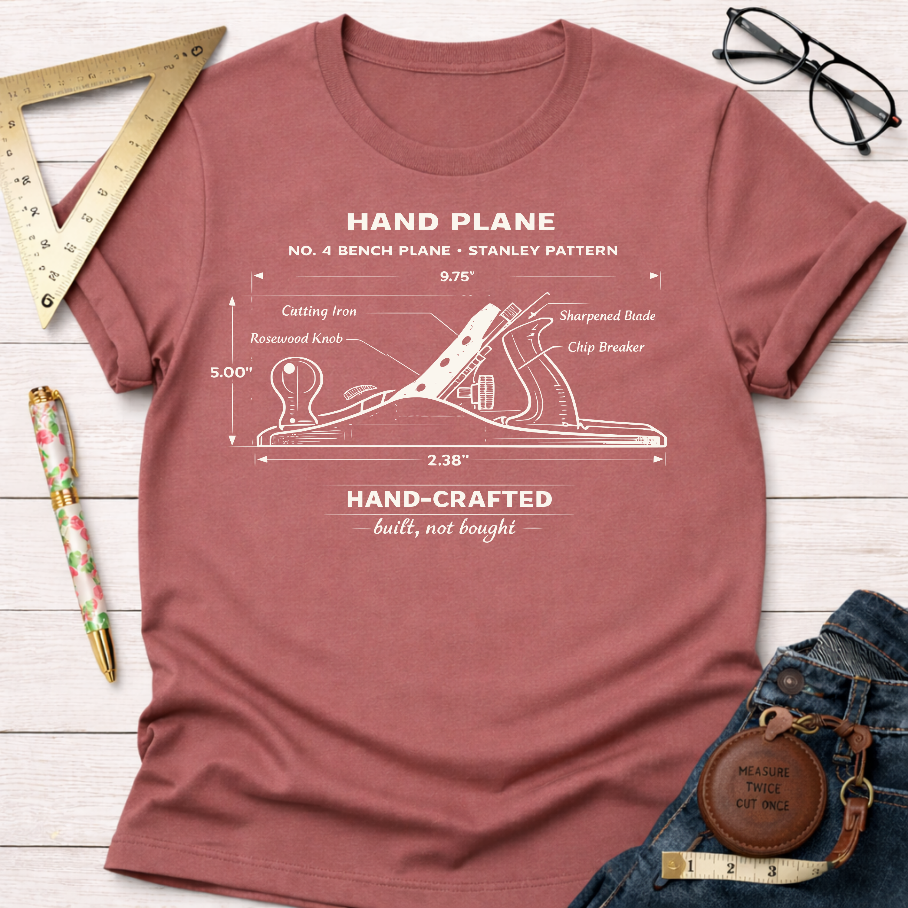 Women's funny woodworking graphic tee shirt for female woodworkers, makers, and DIY builders — Sawdust & Ponytails. Heather clay t-shirt with a white No. 4 bench plane diagram.