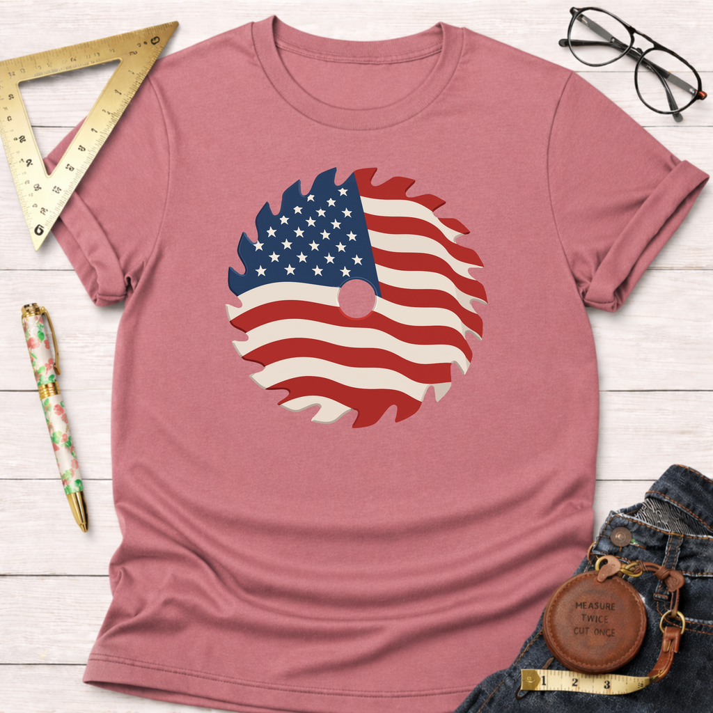 Patriotic Saw Blade T-Shirt: Dusty rose 100% cotton tee with an American flag saw blade graphic.