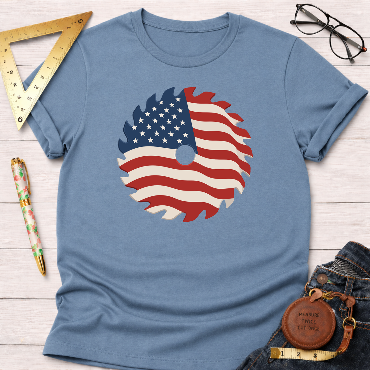 Light blue cotton t-shirt with a patriotic saw blade design featuring the American flag.