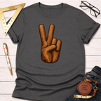 Charcoal gray t-shirt with a "Peace" sign hand graphic made of wood grain, styled for woodworkers.