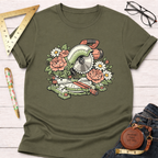 Olive green t-shirt with a floral miter saw graphic, surrounded by pink peonies and white daisies.