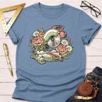 Blue t-shirt with a floral miter saw design, surrounded by pink peonies and white daisies.