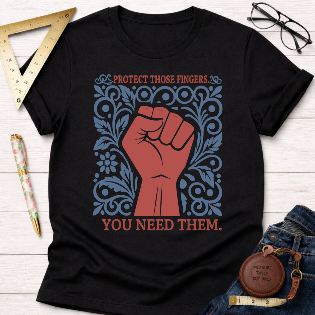 Black cotton t-shirt with a red fist and blue floral design, text reads "Protect Those Fingers You Need Them.