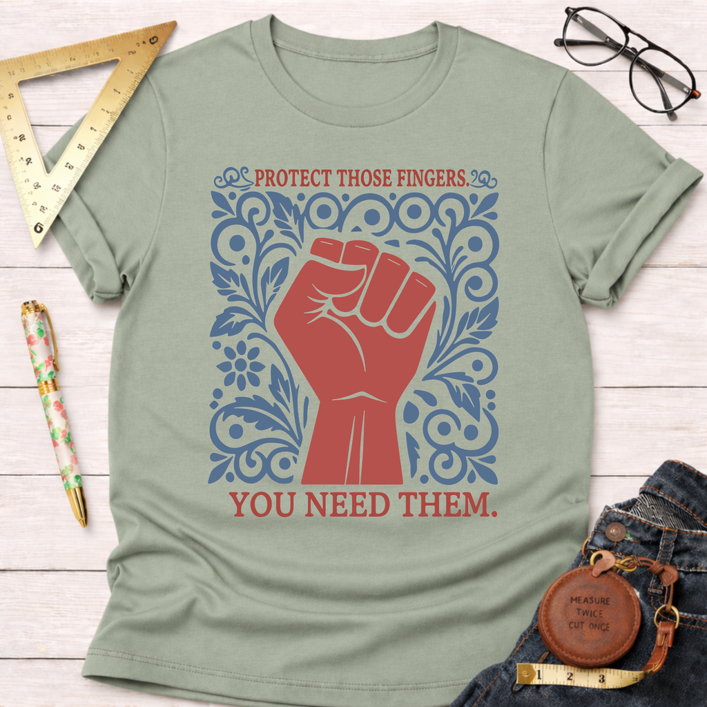 Sage green cotton t-shirt with a red fist and blue floral design, "PROTECT THOSE FINGERS. YOU NEED THEM." text.