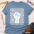 Blue cotton t-shirt with a white graphic of a fist surrounded by ornate floral designs and the text "PROTECT THOSE FINGERS. YOU NEED THEM.