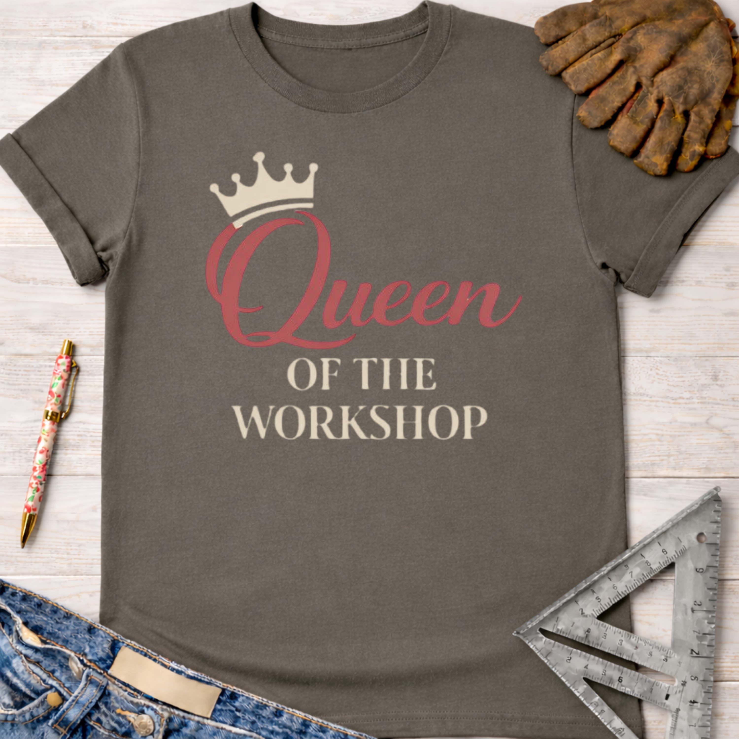 Charcoal gray "Queen of The Workshop" graphic tee with a crown, for female woodworkers, makers, and DIY builders.