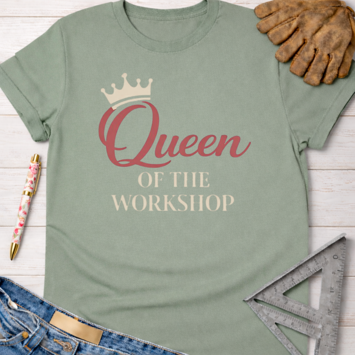Sage green "Queen of The Workshop" graphic tee with crown, jeans, work glove, and ruler.