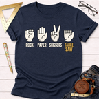 Navy blue Rock Paper Scissors Table Saw T-shirt with white and gold graphic print.
