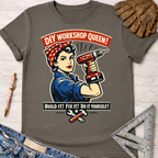 Women's funny woodworking graphic tee shirt for female woodworkers, makers, and DIY builders — Sawdust & Ponytails. Dark gray crew neck t-shirt with a Rosie the Riveter-style graphic holding a drill, "DIY Workshop Queen!" and "Build It! Fix It! Do It Yourself!" text.