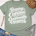 Sage green t-shirt with "Running on Caffeine and Questionable Decisions" in white script.