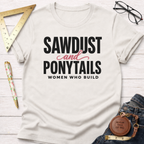 White cotton "Sawdust and Ponytails Women Who Build" t-shirt with black and pink text.