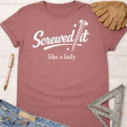 Women's funny woodworking graphic tee shirt for female woodworkers, makers, and DIY builders — Sawdust & Ponytails. Mauve cotton tee with "Screwed It like a lady" graphic.