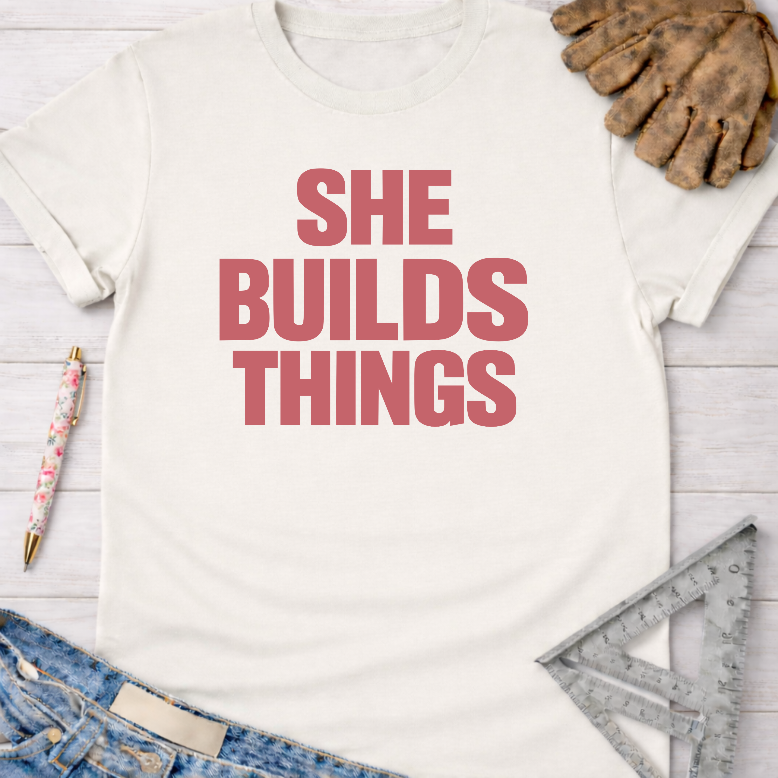 White cotton "SHE BUILDS THINGS" tee, Women's funny woodworking graphic tee shirt for female woodworkers, makers, and DIY builders — Sawdust & Ponytails