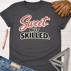 Women's charcoal gray "Sweet But Skilled" graphic tee for woodworkers, makers, and DIY builders — Sawdust & Ponytails