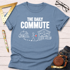 Light blue cotton t-shirt with "THE DAILY COMMUTE" text and stick figure walking from house to workshop.
