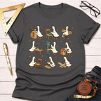 Women's funny woodworking graphic tee shirt for female woodworkers, makers, and DIY builders — Sawdust & Ponytails. Dark gray cotton tee with cartoon ducks building furniture.
