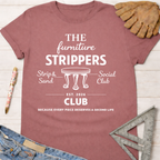 Women's funny woodworking graphic tee shirt for female woodworkers, makers, and DIY builders — Sawdust & Ponytails. Mauve cotton t-shirt with "The Furniture Strippers Social Club" graphic.